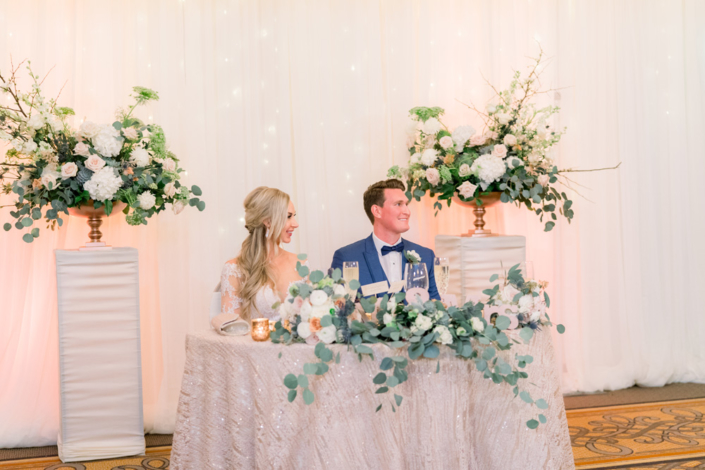 Bride And Groom Table Floral Arrangement