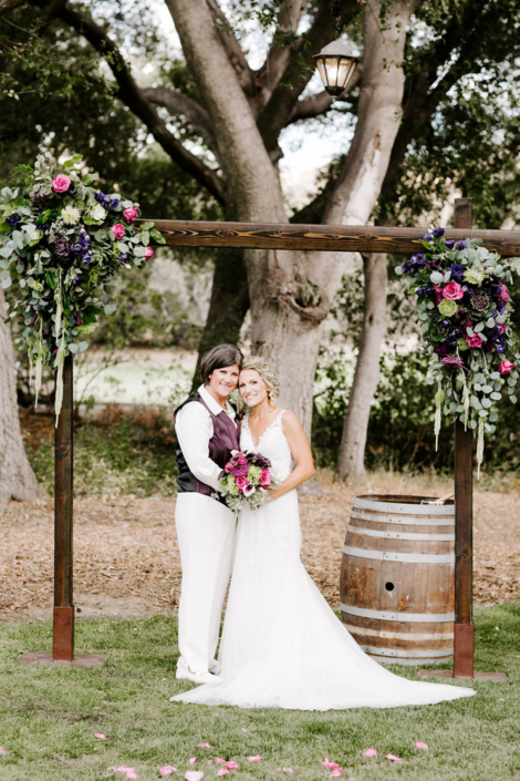 Two Women Wedding Altar Flowers Rustic Wooden